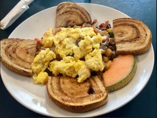Scrambled eggs with marble rye toast