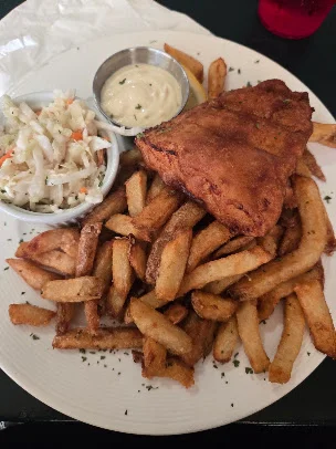 Fish and chips with coleslaw and tartar sauce